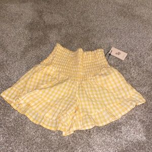 yellow checkered high waisted ruffle shorts